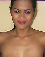 bargirls smiles while she is posing all nude in the philippines